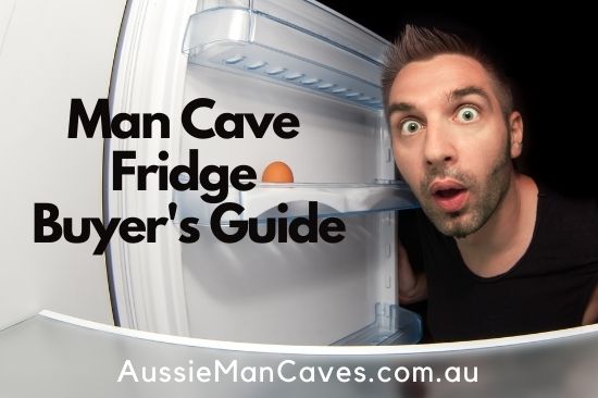 Surprised man looking inside through a fridge door